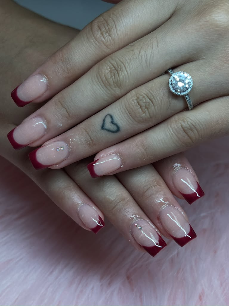 Deep red French tip nails