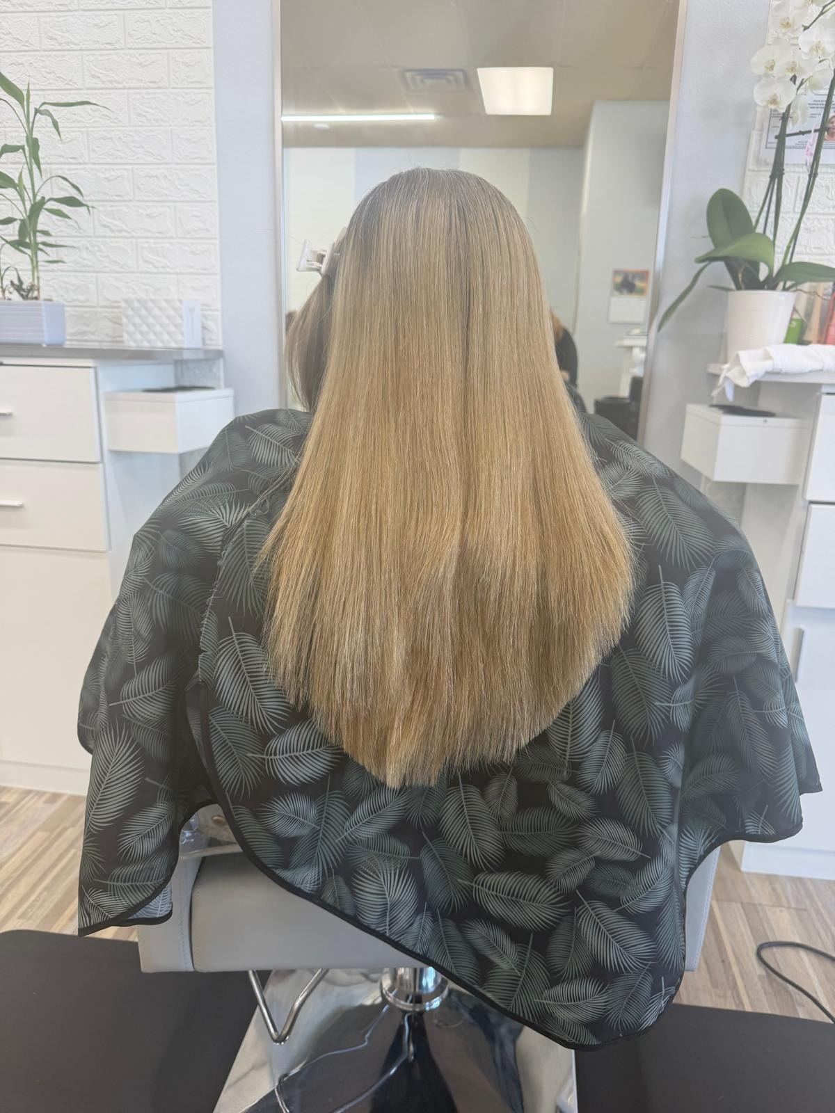 Long sandy blonde straight blowout