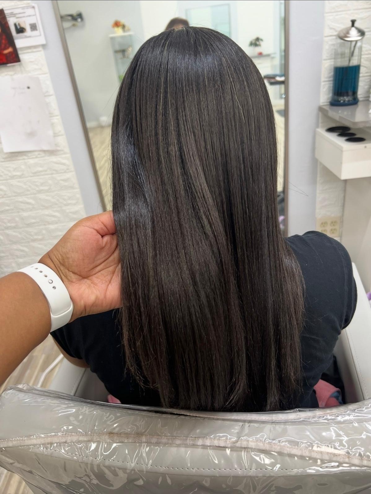 Glossy dark brown silk press