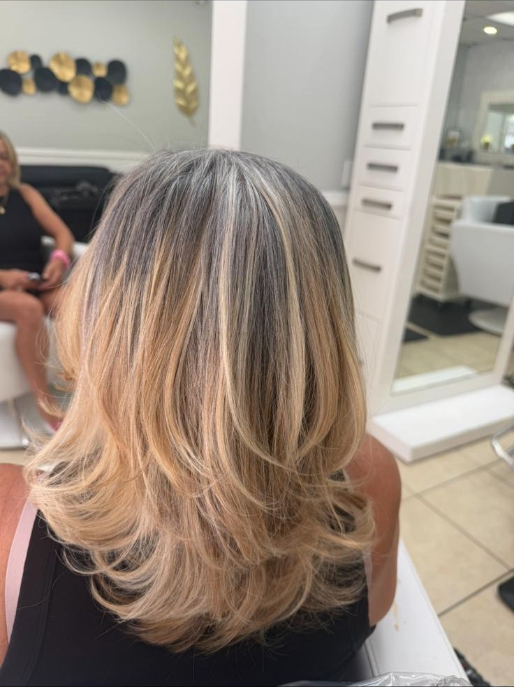 Blonde balayage with soft layers